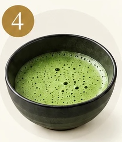 A bowl of frothy matcha